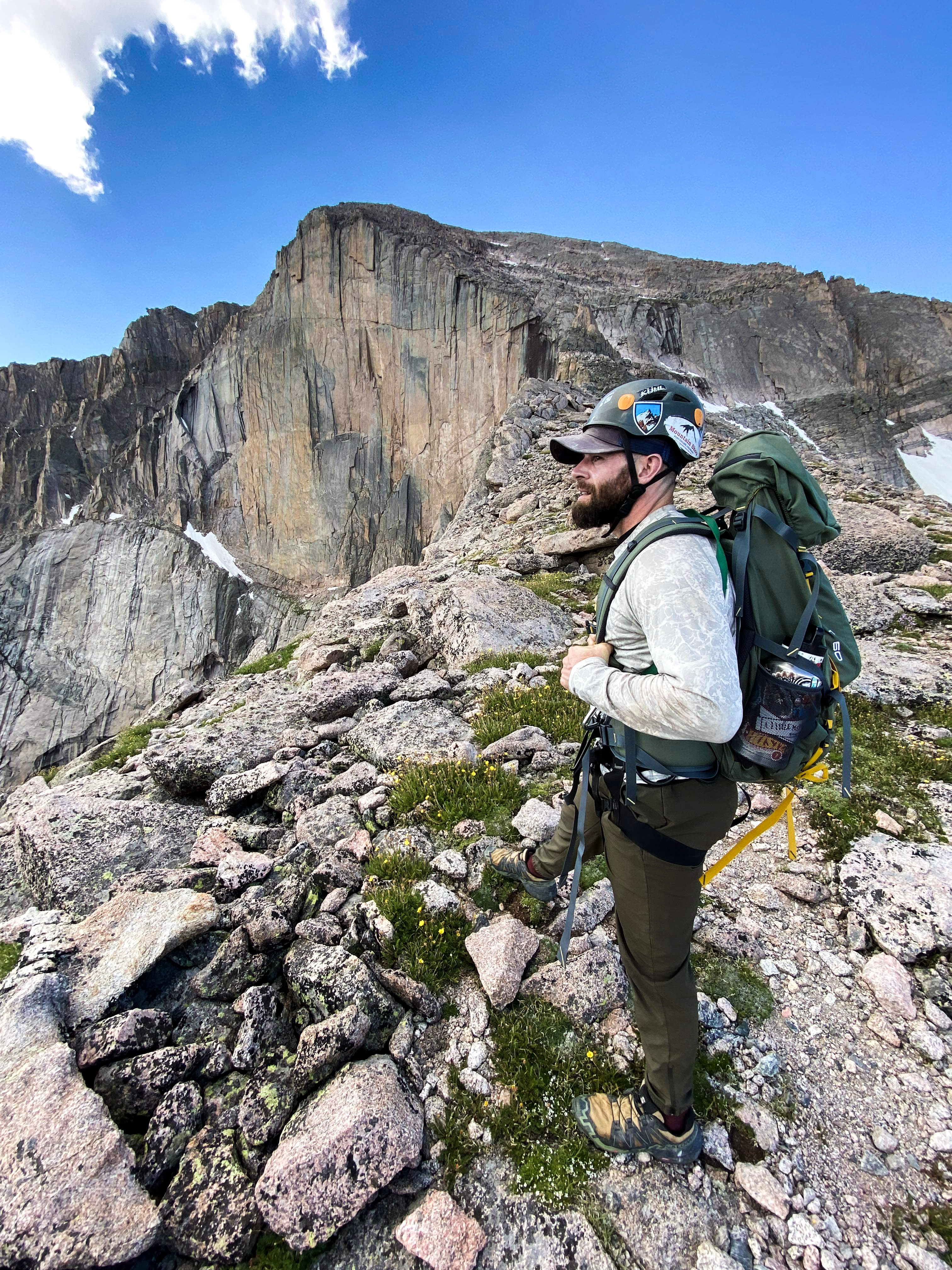 Joey Barron overlooking a mountain landscape